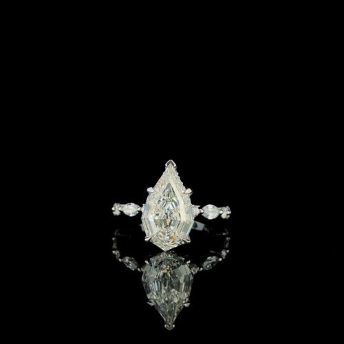 WhatsApp Image 2026-07-22 at 1.29.16 PM Solitair step cut pear diamond ring